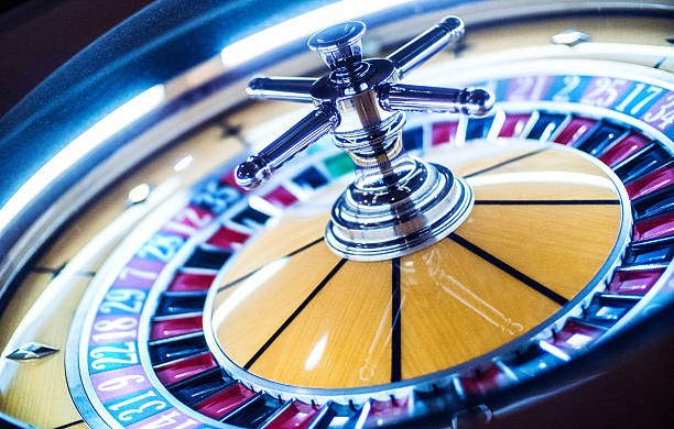 Multi-camera live baccarat table showing dealer position and betting layout